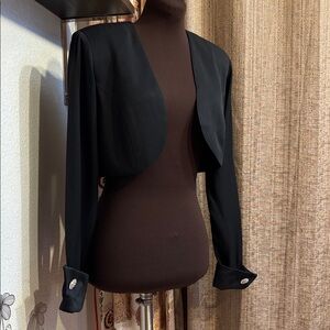 Vintage 1980’s Cache black long sleeve cropped open bolero jacket. Size 3-4.